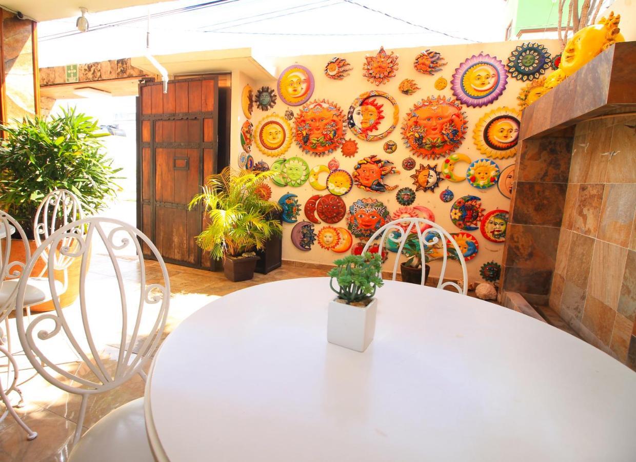 Papagayo Hotel Boutique Playa del Carmen Eksteriør bilde A patio in the center of the house