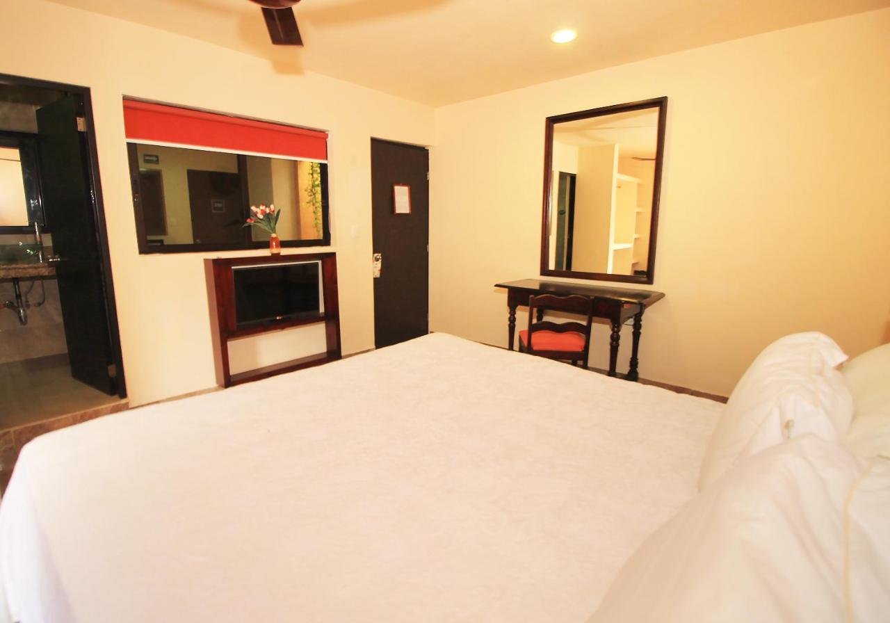 Papagayo Hotel Boutique Playa del Carmen Eksteriør bilde A room at the hotel
