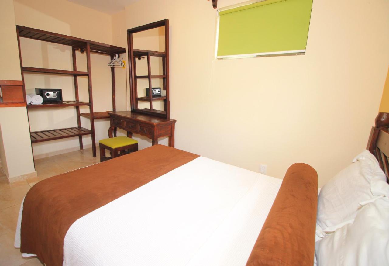 Papagayo Hotel Boutique Playa del Carmen Eksteriør bilde A bedroom at the hotel