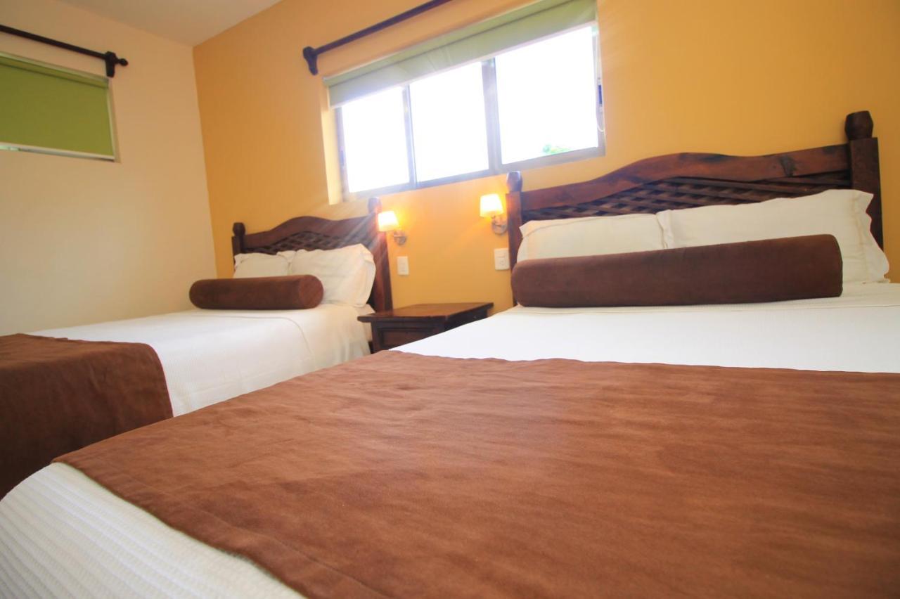Papagayo Hotel Boutique Playa del Carmen Eksteriør bilde A room at the hotel